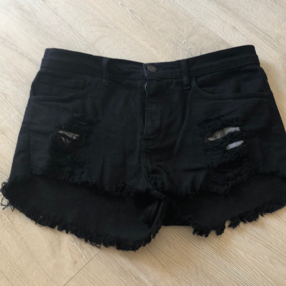 Black distressed shorts